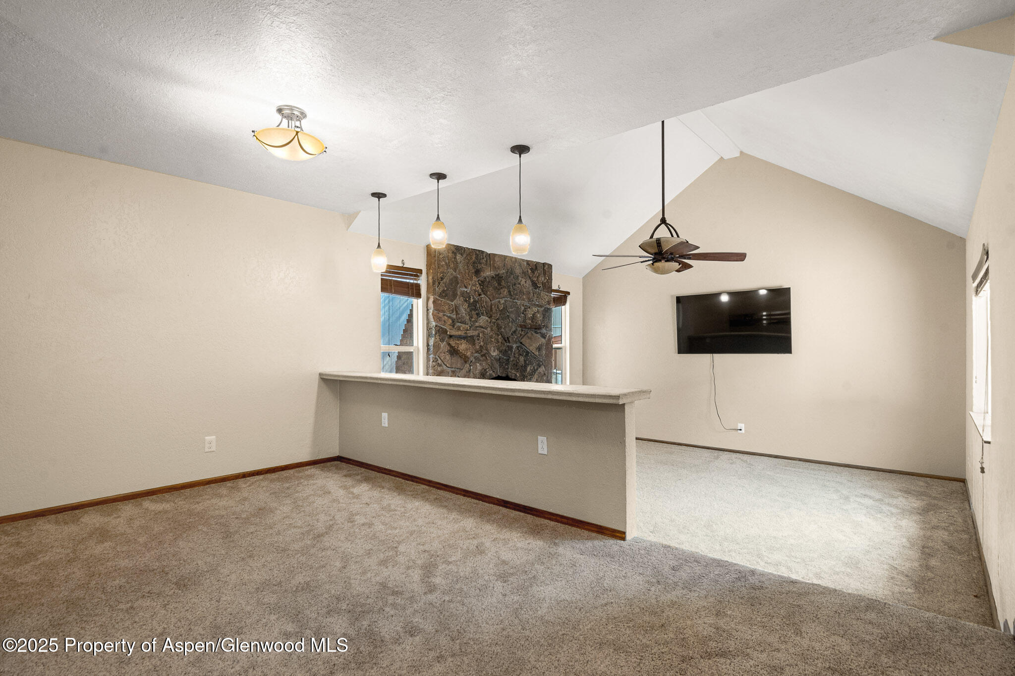 520 Aspen Avenue Rifle, CO 81650 - Photo 4 of 31 a view of a room with a ceiling fan