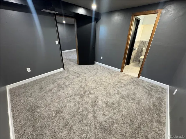 a bathroom with a toilet and a sink