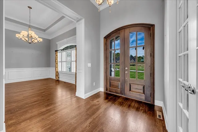 a large kitchen with stainless steel appliances kitchen island granite countertop a large counter top and stove