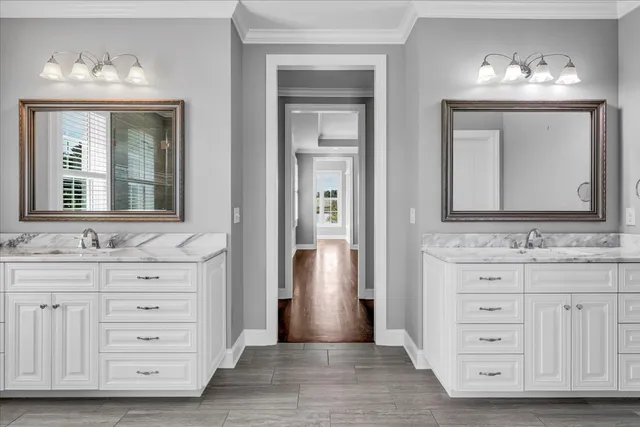 a front view of a house with a yard and outdoor seating