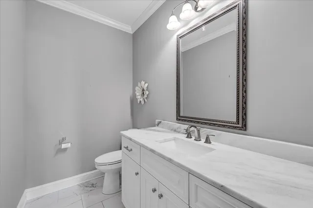 a en suite bathroom with a bathtub sink and mirror