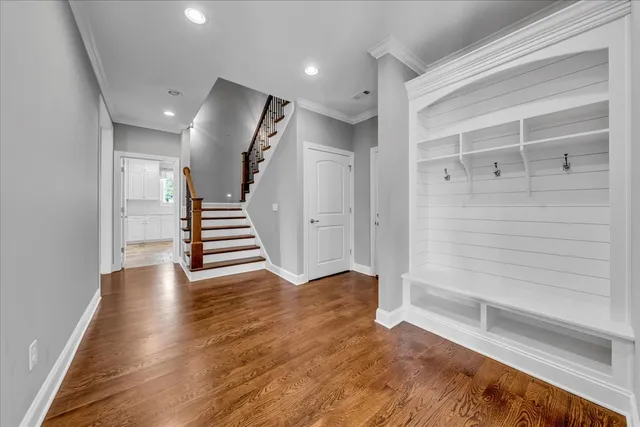 a view of a lake with houses in the back