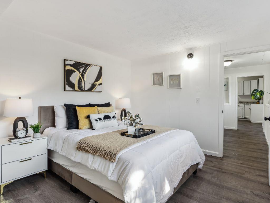 1684 Hill Road Novato, CA 94947 - Photo 15 of 21 a bedroom with bed and a potted plant