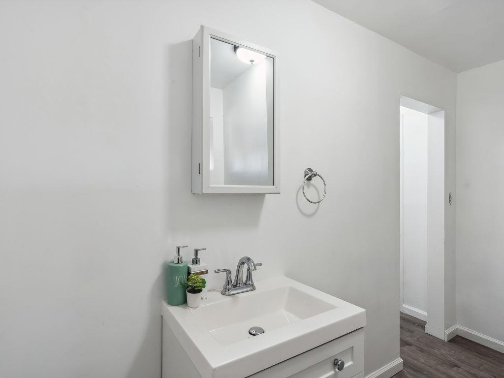 1684 Hill Road Novato, CA 94947 - Photo 17 of 21 a bathroom with a sink and vanity