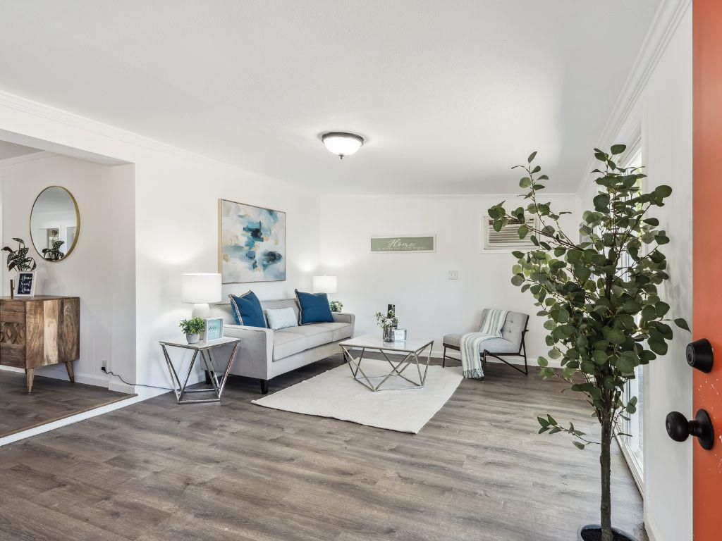 1684 Hill Road Novato, CA 94947 - Photo 5 of 21 a living room with furniture plant and a potted plant