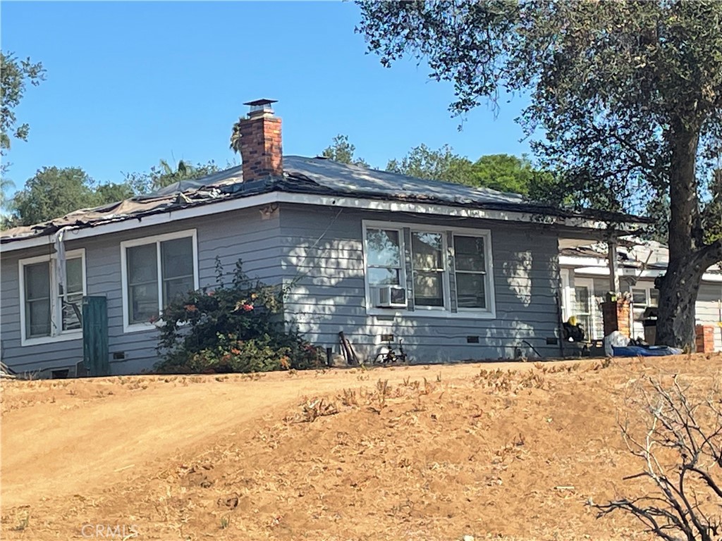 a view of house with outdoor space