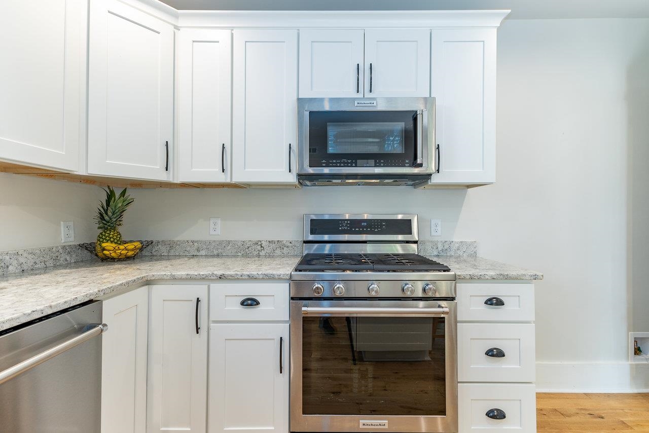 10 Todd Road Mount Sidney, VA 24467 - Photo 11 of 57 a kitchen with white cabinets and a stove with a sink