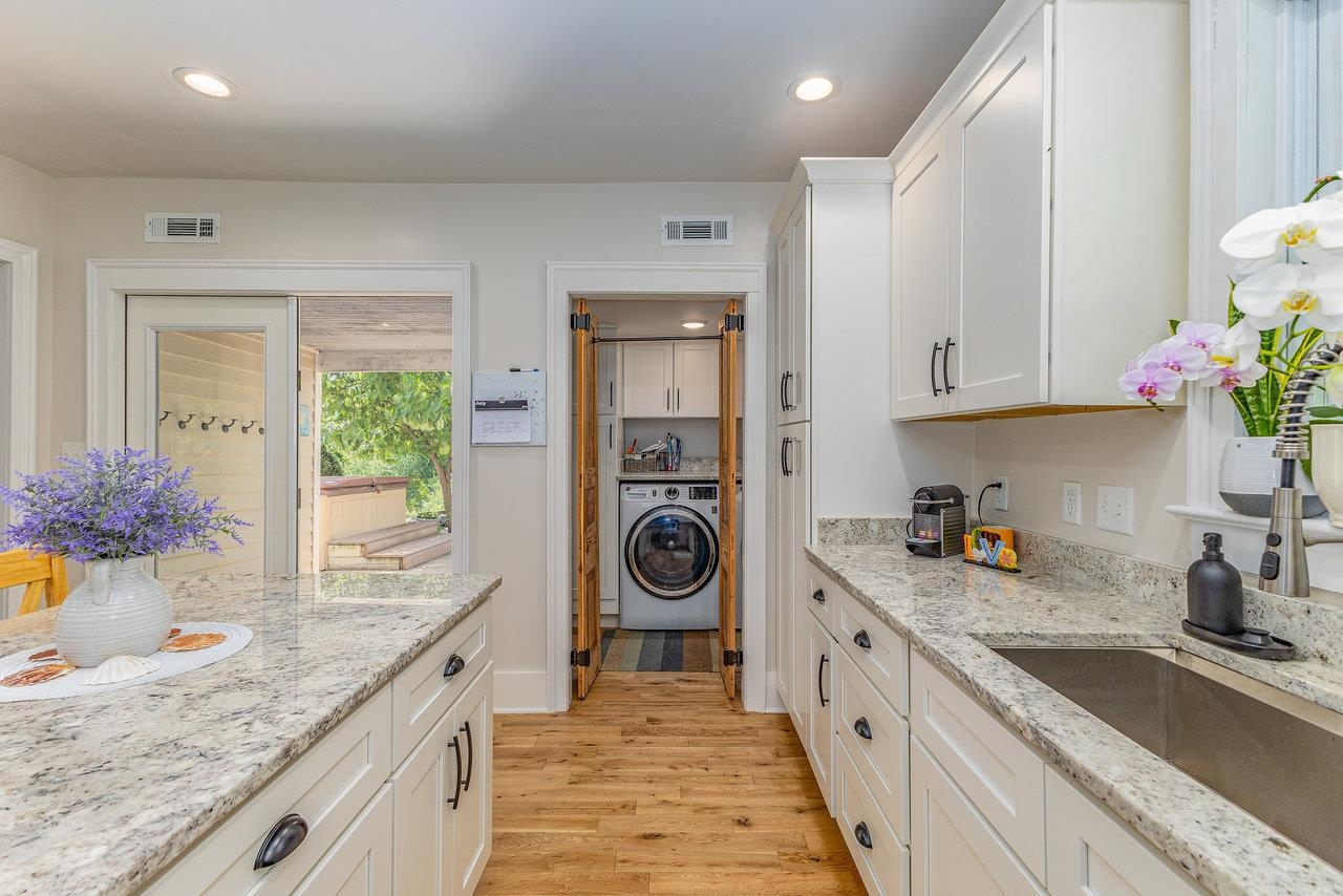 10 Todd Road Mount Sidney, VA 24467 - Photo 12 of 57 a large kitchen with granite countertop a sink and cabinets