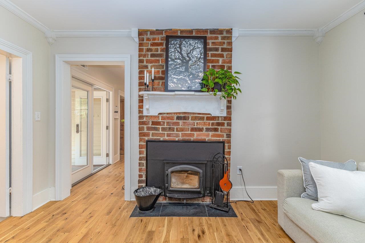 10 Todd Road Mount Sidney, VA 24467 - Photo 17 of 57 a living room with a fireplace and wooden floor