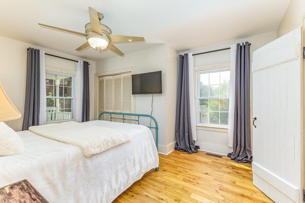 10 Todd Road Mount Sidney, VA 24467 - Photo 24 of 57 a bedroom with a bed and a chandelier