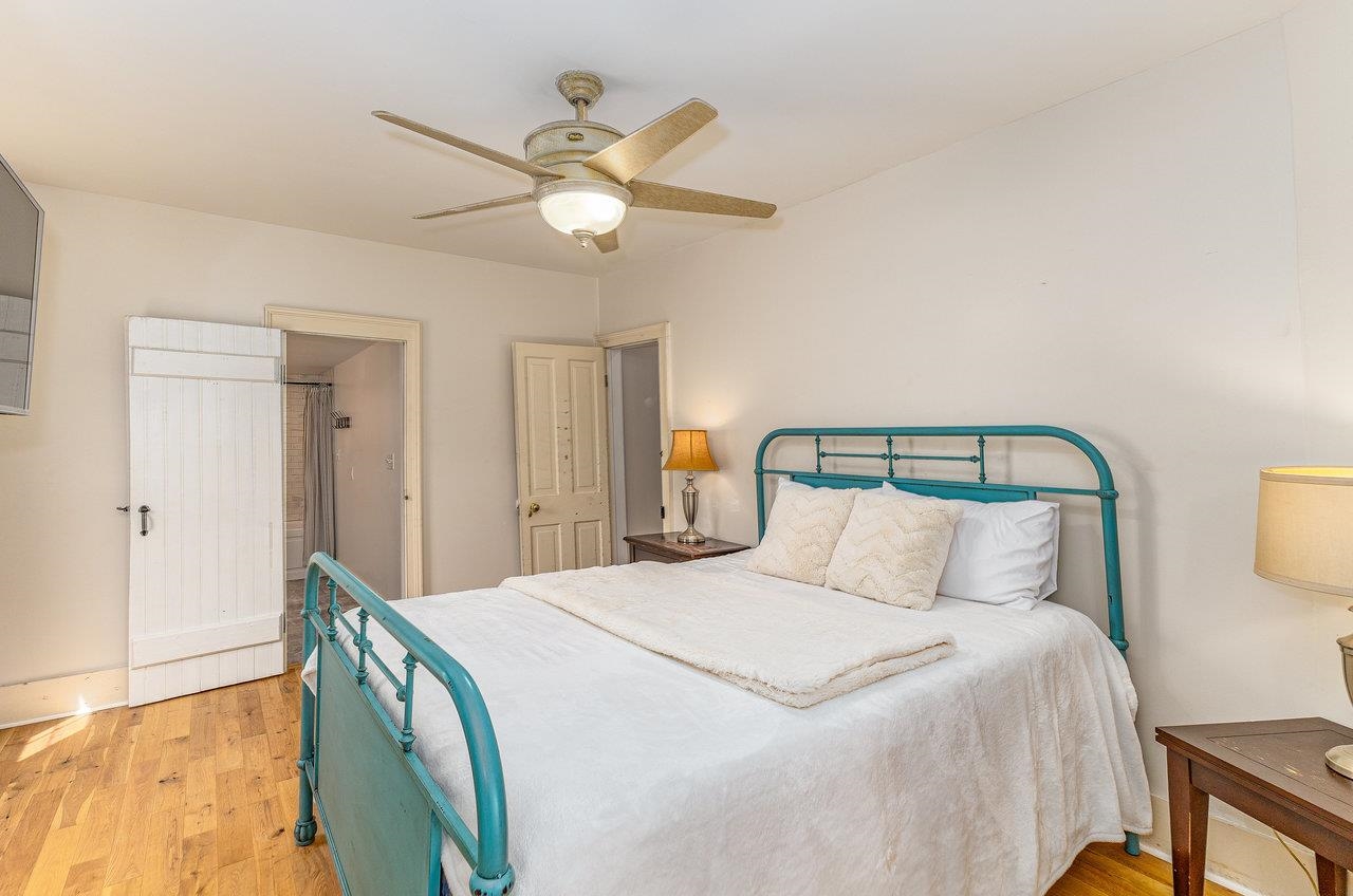 10 Todd Road Mount Sidney, VA 24467 - Photo 26 of 57 a bedroom with a bed and a chandelier