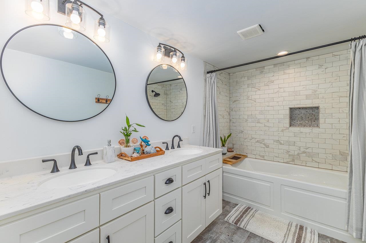 10 Todd Road Mount Sidney, VA 24467 - Photo 27 of 57 a bathroom with a double vanity sink mirror and bathtub