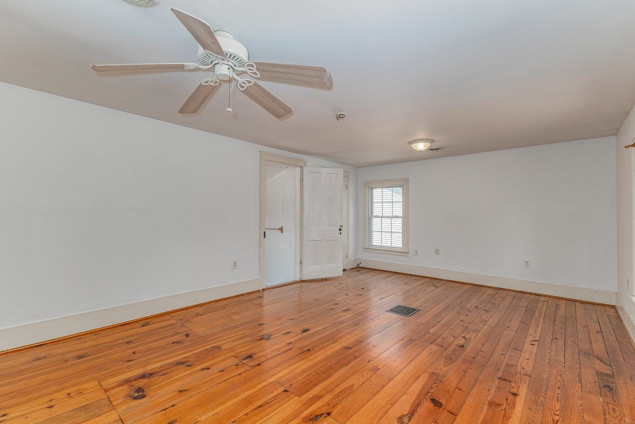 10 Todd Road Mount Sidney, VA 24467 - Photo 28 of 57 a view of an empty room with wooden floor and a ceiling fan