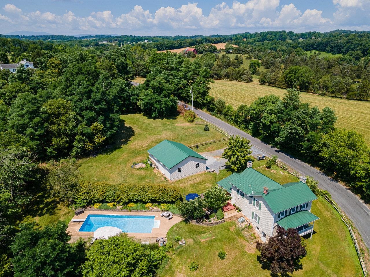 10 Todd Road Mount Sidney, VA 24467 - Photo 3 of 57 an aerial view of a house with a garden and swimming pool