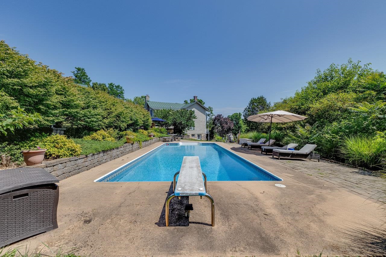 10 Todd Road Mount Sidney, VA 24467 - Photo 39 of 57 a view of a swimming pool with a yard and a fountain