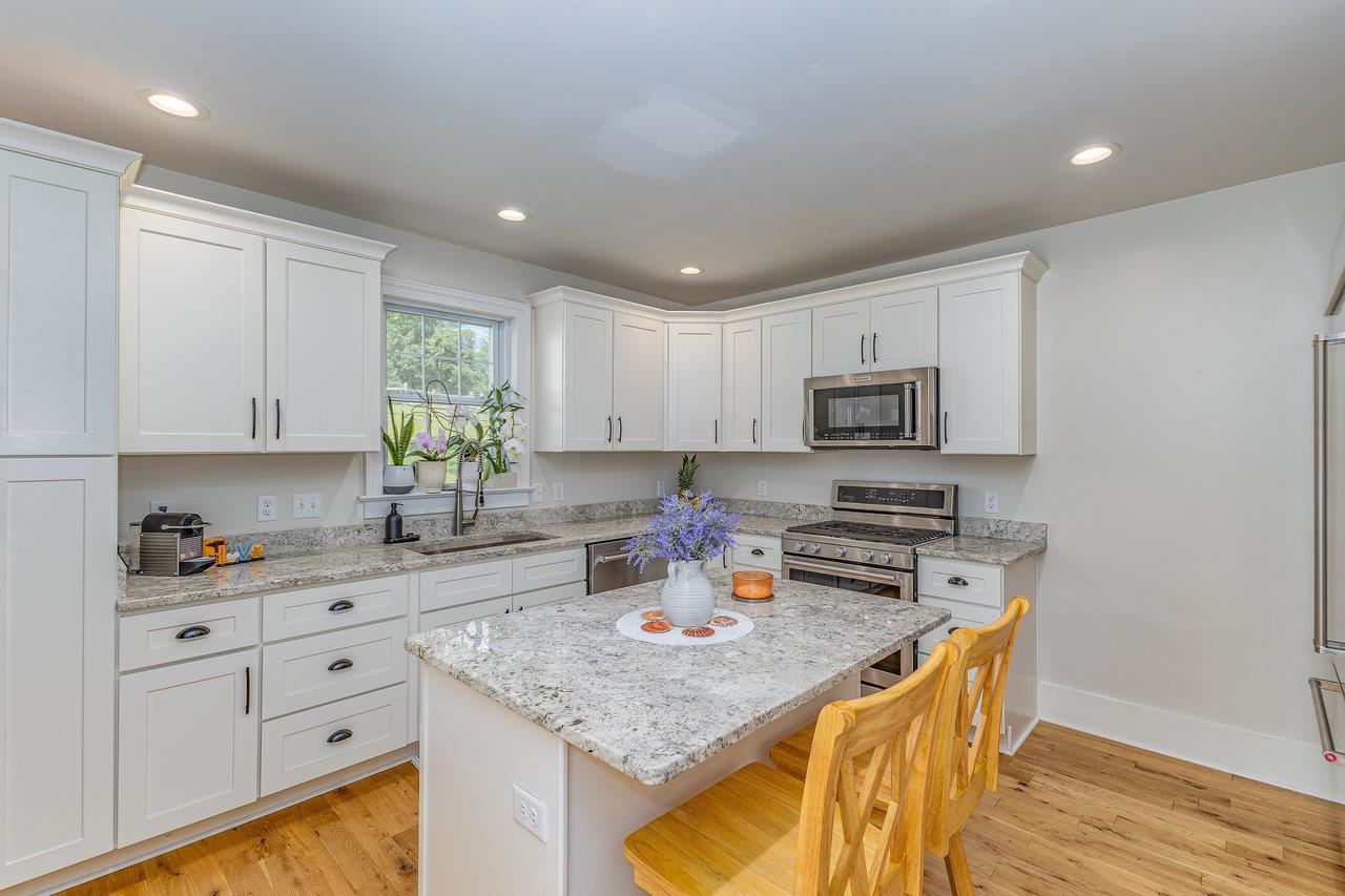 10 Todd Road Mount Sidney, VA 24467 - Photo 7 of 57 a kitchen with stainless steel appliances granite countertop a sink dishwasher and cabinets with wooden floor