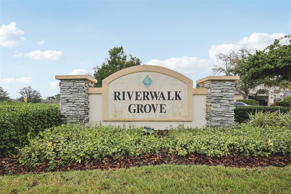 7164 Spikerush Court Lakewood Ranch, FL 34202 - Photo 35 of 36 a sign on the side of a building