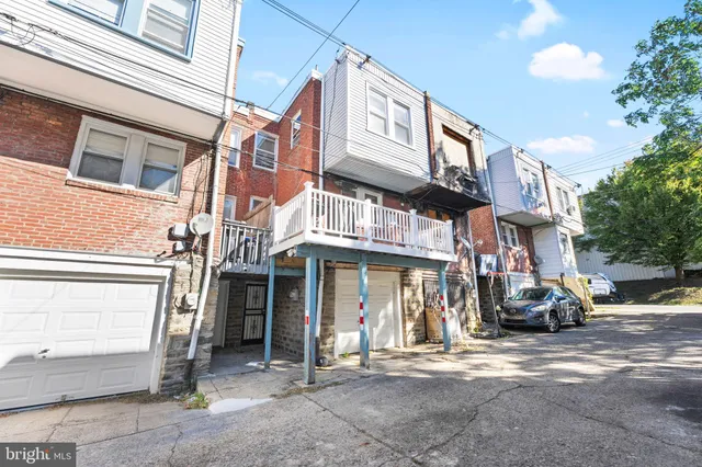 a view of a building with sitting area