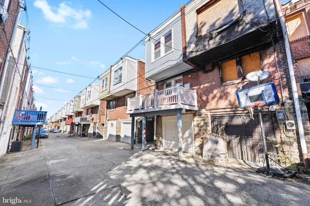 a view of a building with a street