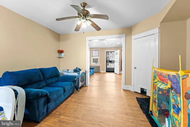 a living room with furniture and a rug