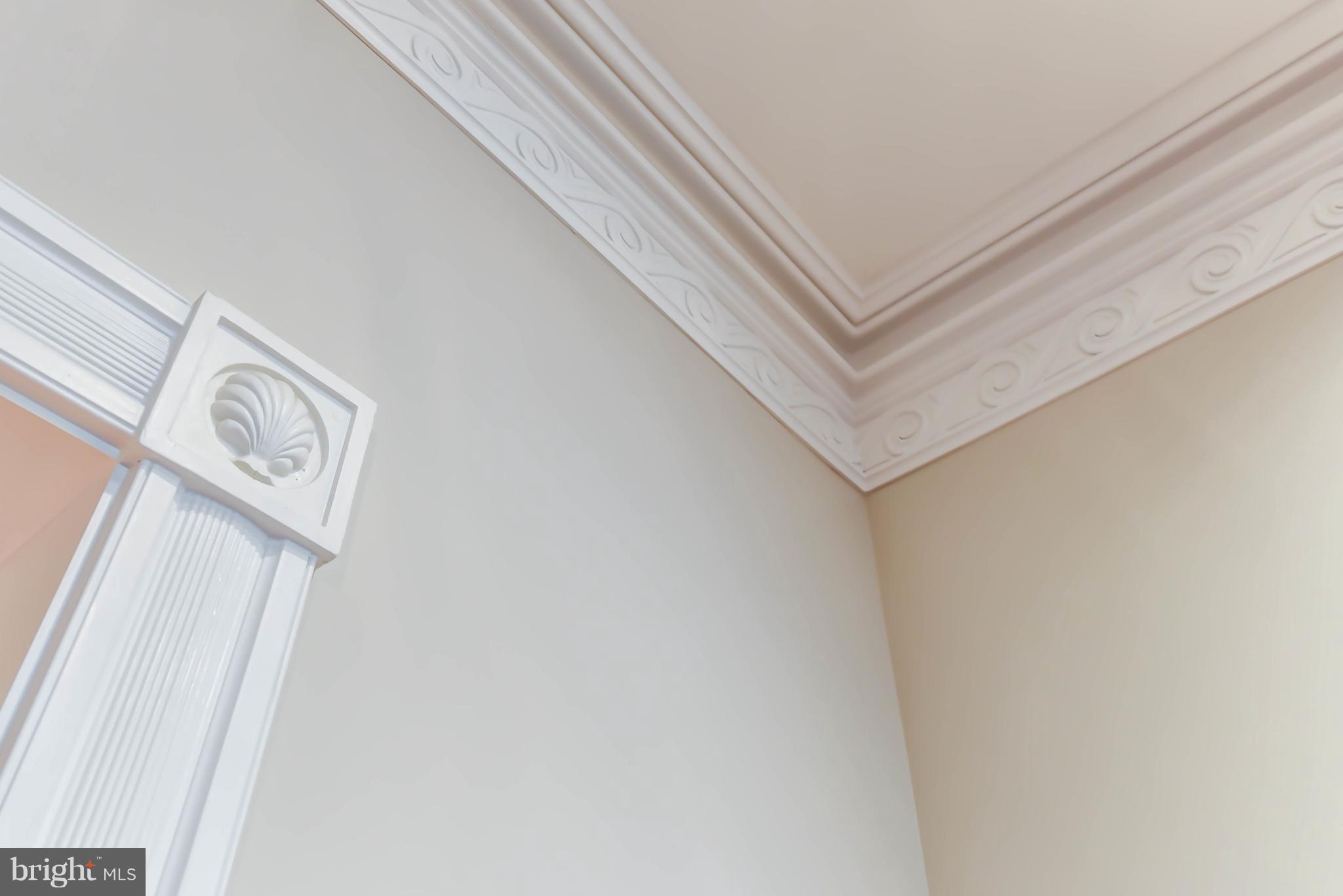 7615 Southdown Road Alexandria, VA 22308 - Photo 26 of 80 Hand cut crown molding with custom rosettes