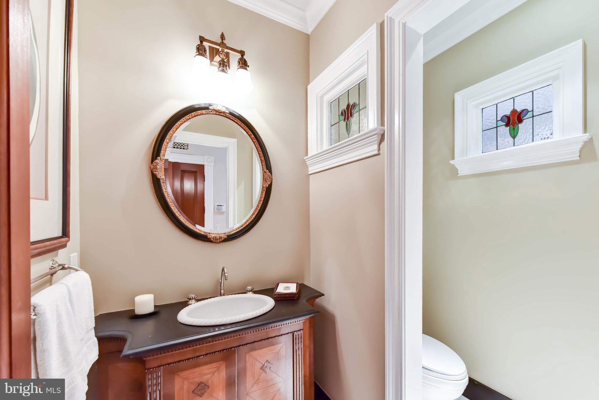 7615 Southdown Road Alexandria, VA 22308 - Photo 39 of 80 Main Level Powder Room with custom mosaic tile