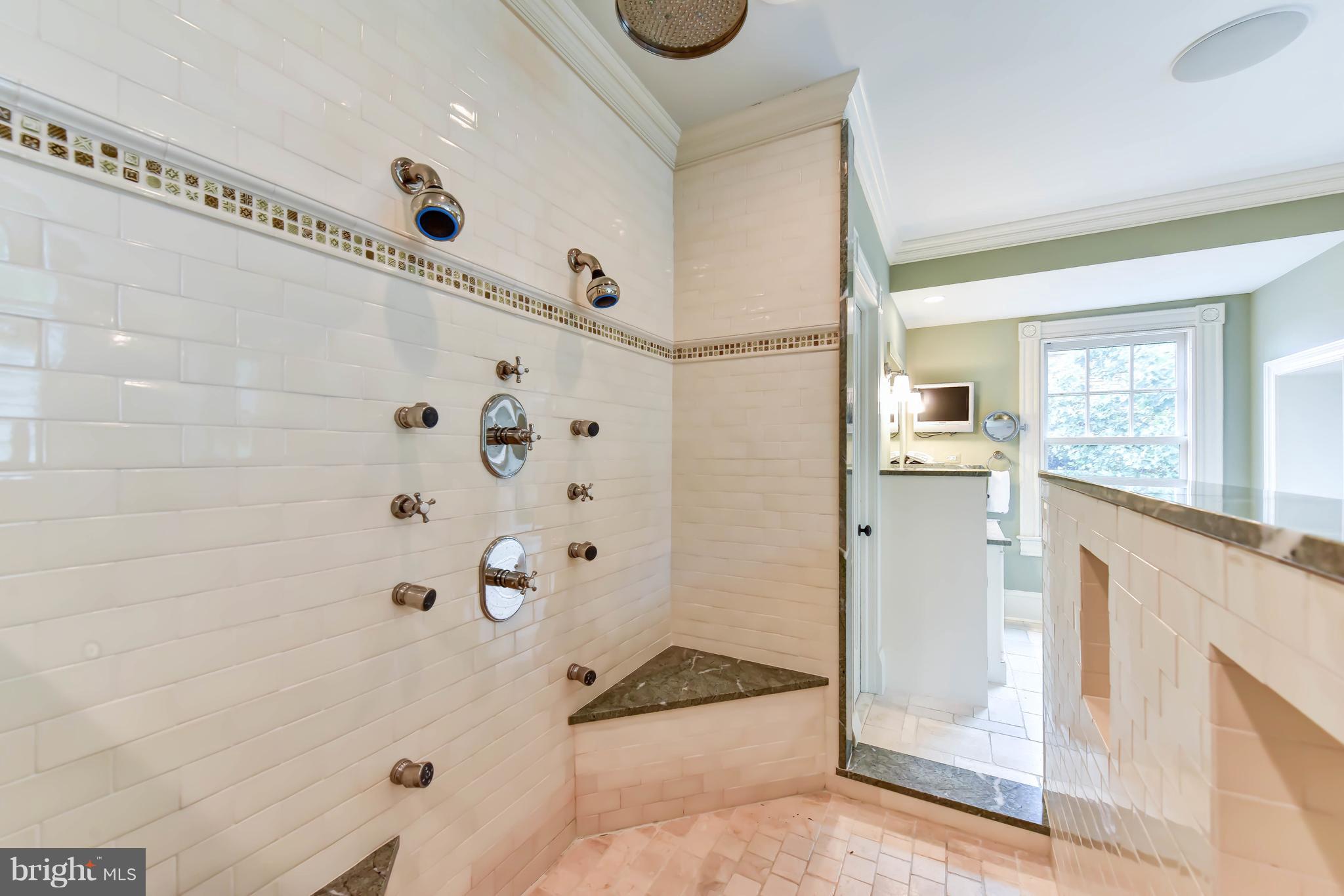 7615 Southdown Road Alexandria, VA 22308 - Photo 48 of 80 Mosaic Flooring in set-in shower
