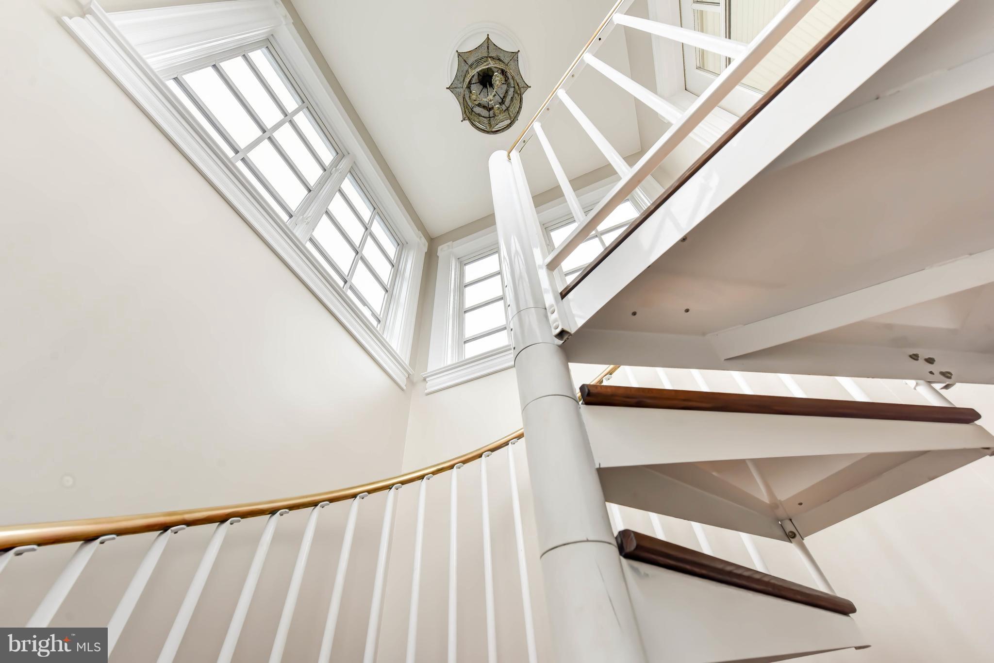 7615 Southdown Road Alexandria, VA 22308 - Photo 55 of 80 Eagle's Nest wrought iron/ brass staircase