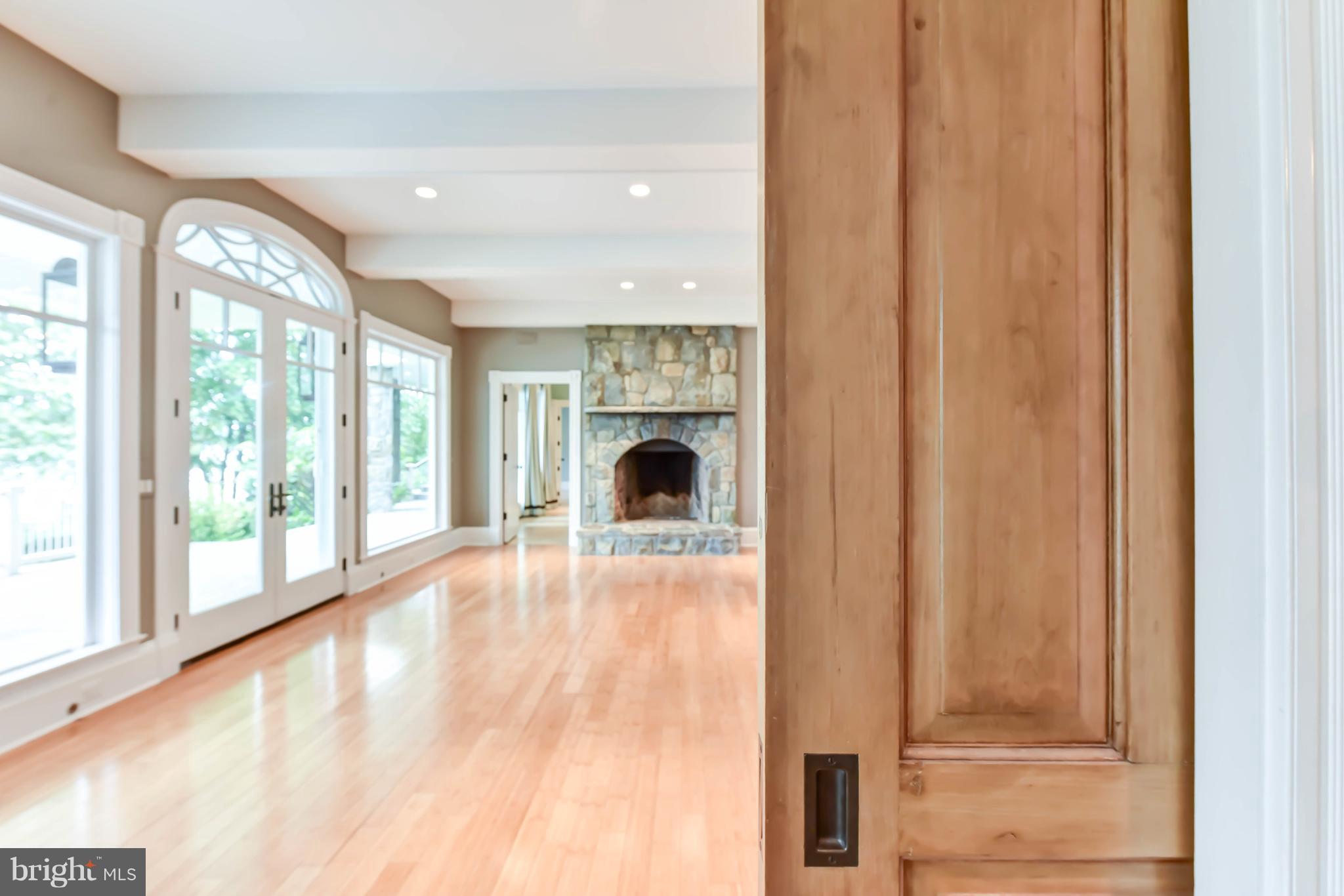 7615 Southdown Road Alexandria, VA 22308 - Photo 59 of 80 Lower Level Family Room with Masonry Fireplace
