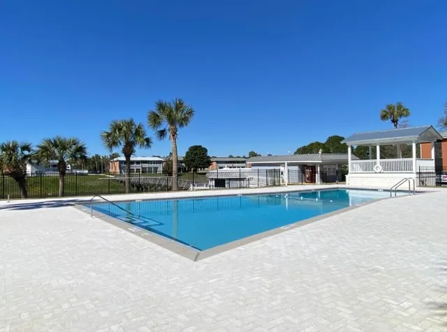 a view of a house with a swimming pool