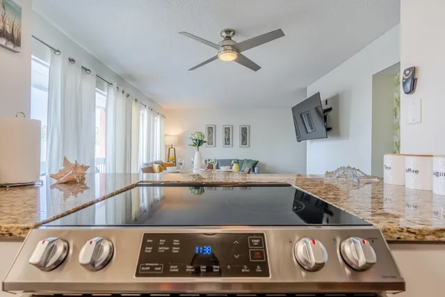 a kitchen with a stove and a cabinet