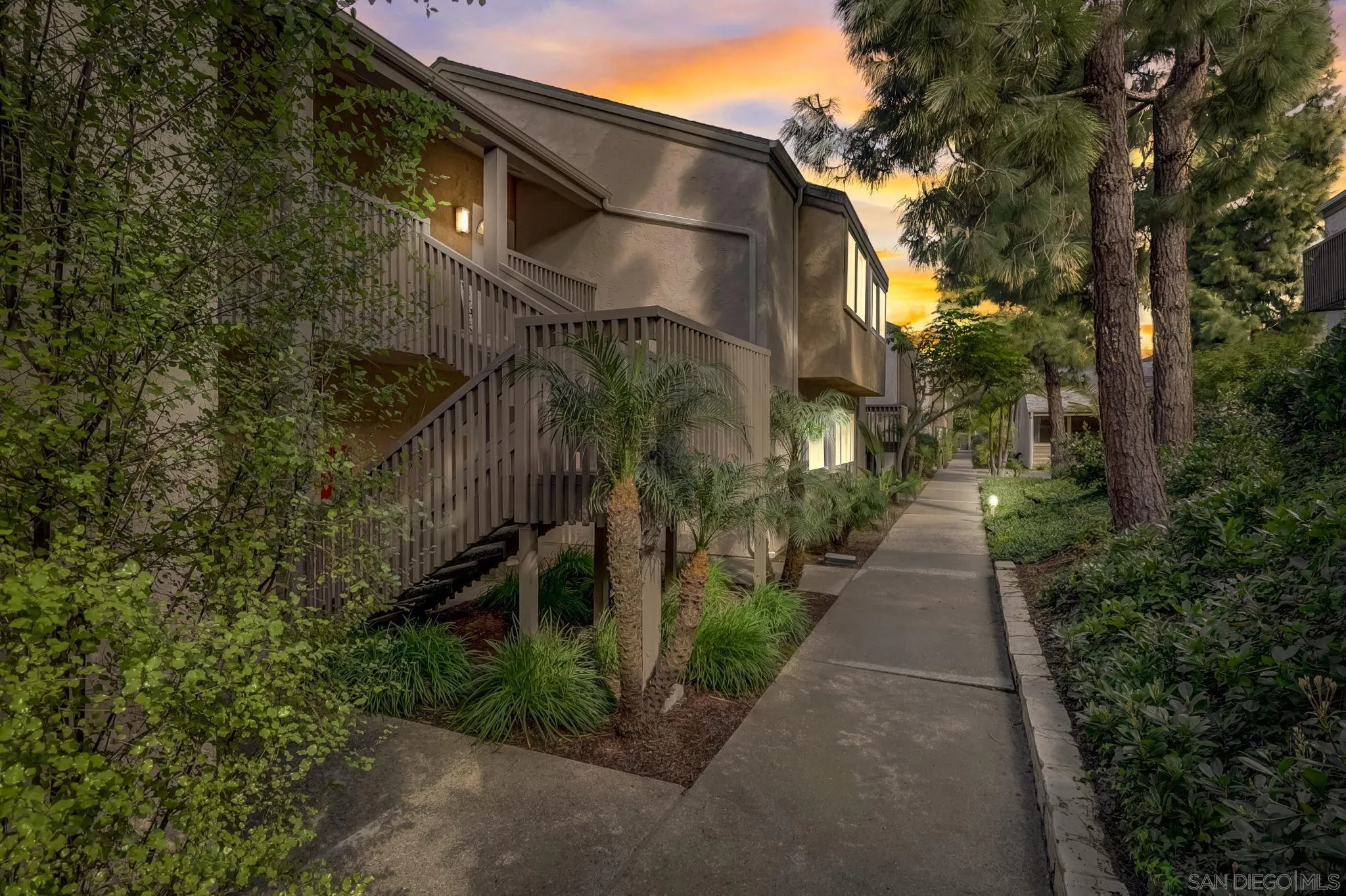 8660 Via Mallorca, Unit B La Jolla, CA 92037 - Photo 15 of 27 a backyard of a house with lots of green space
