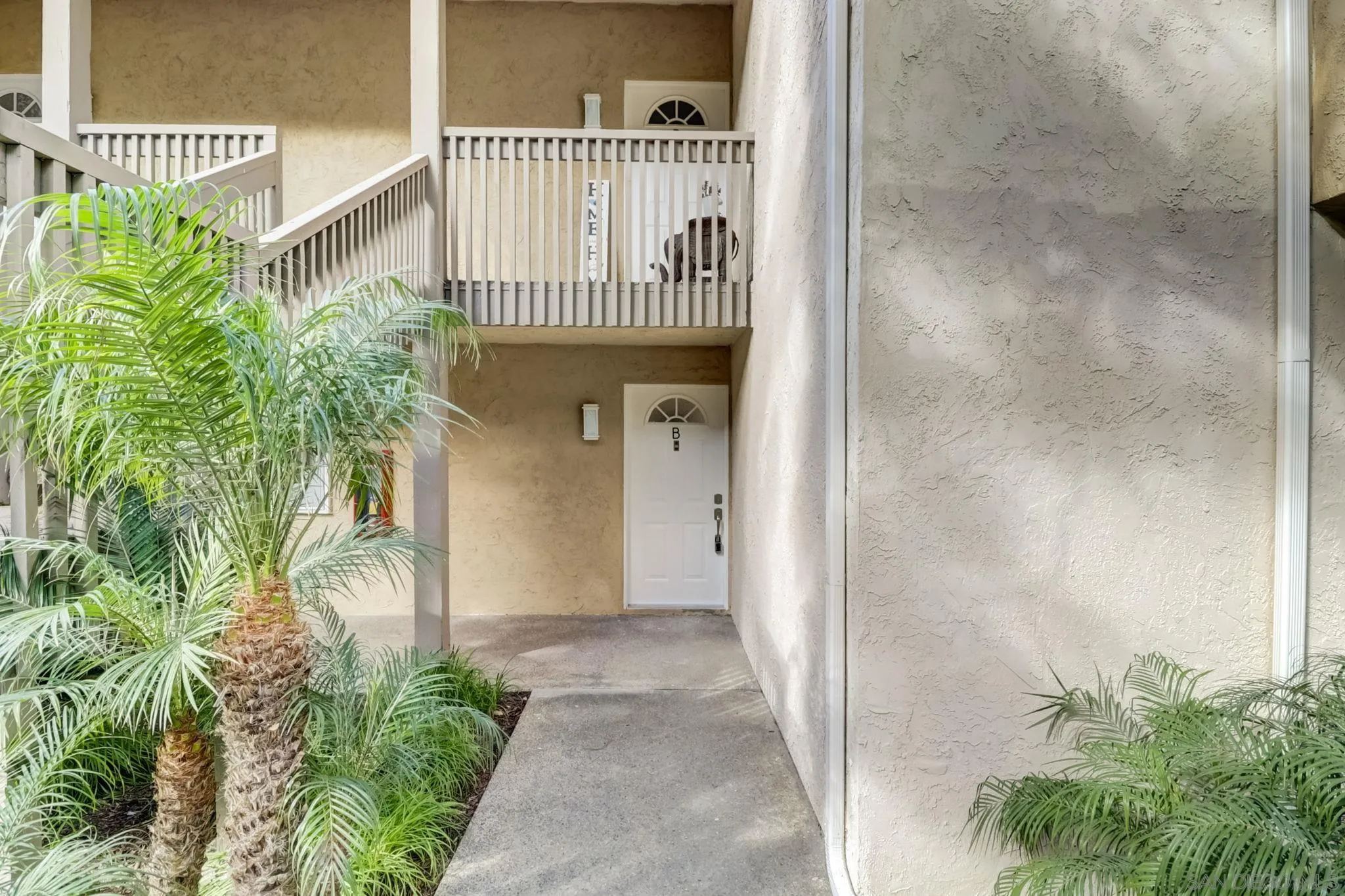 8660 Via Mallorca, Unit B La Jolla, CA 92037 - Photo 21 of 27 a view of a balcony with a plants