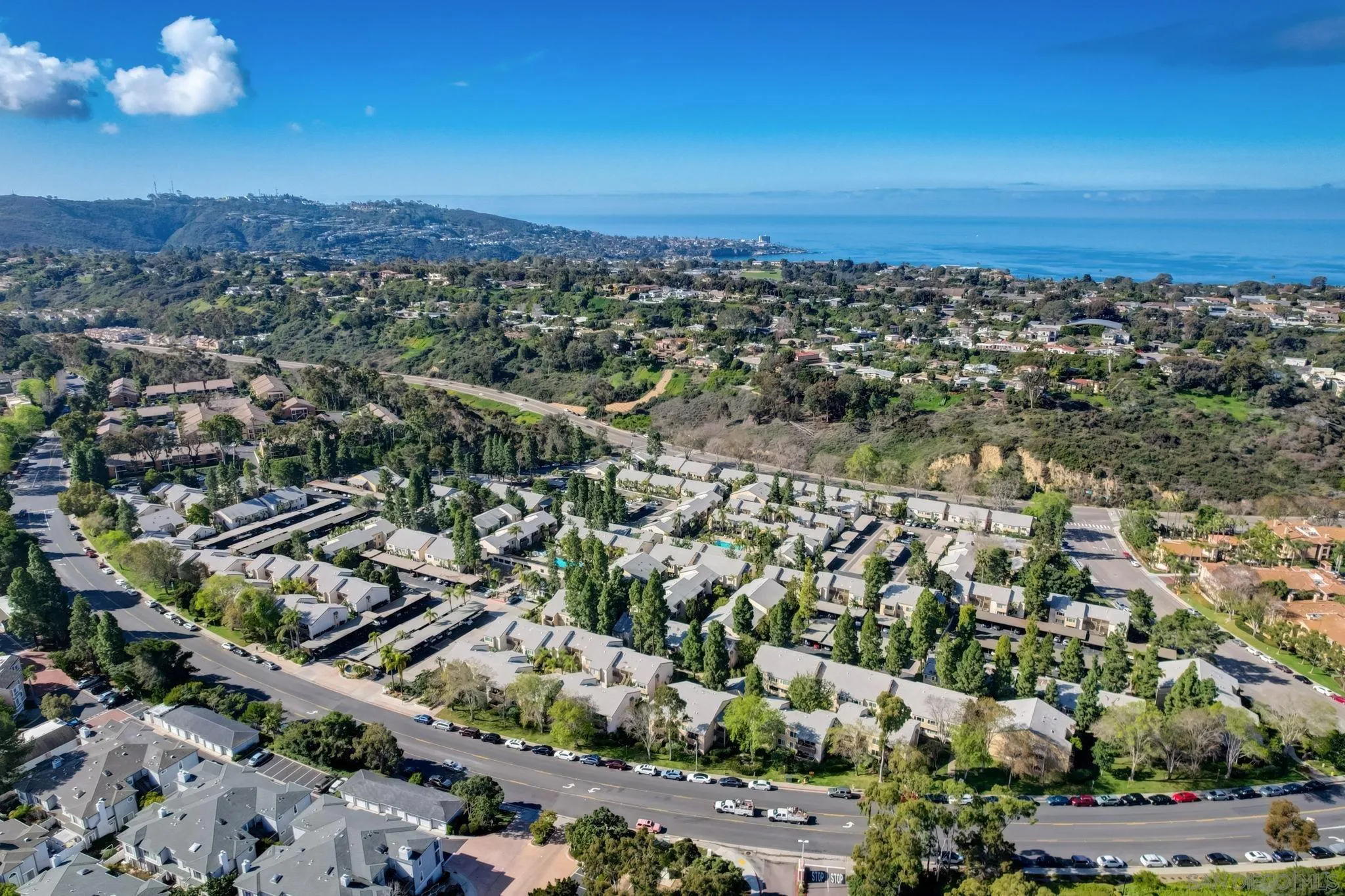 8660 Via Mallorca, Unit B La Jolla, CA 92037 - Photo 23 of 27 an aerial view of a city
