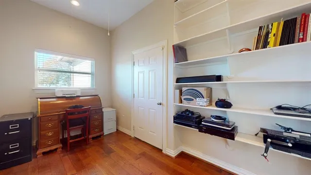 a view of workspace with wooden floor