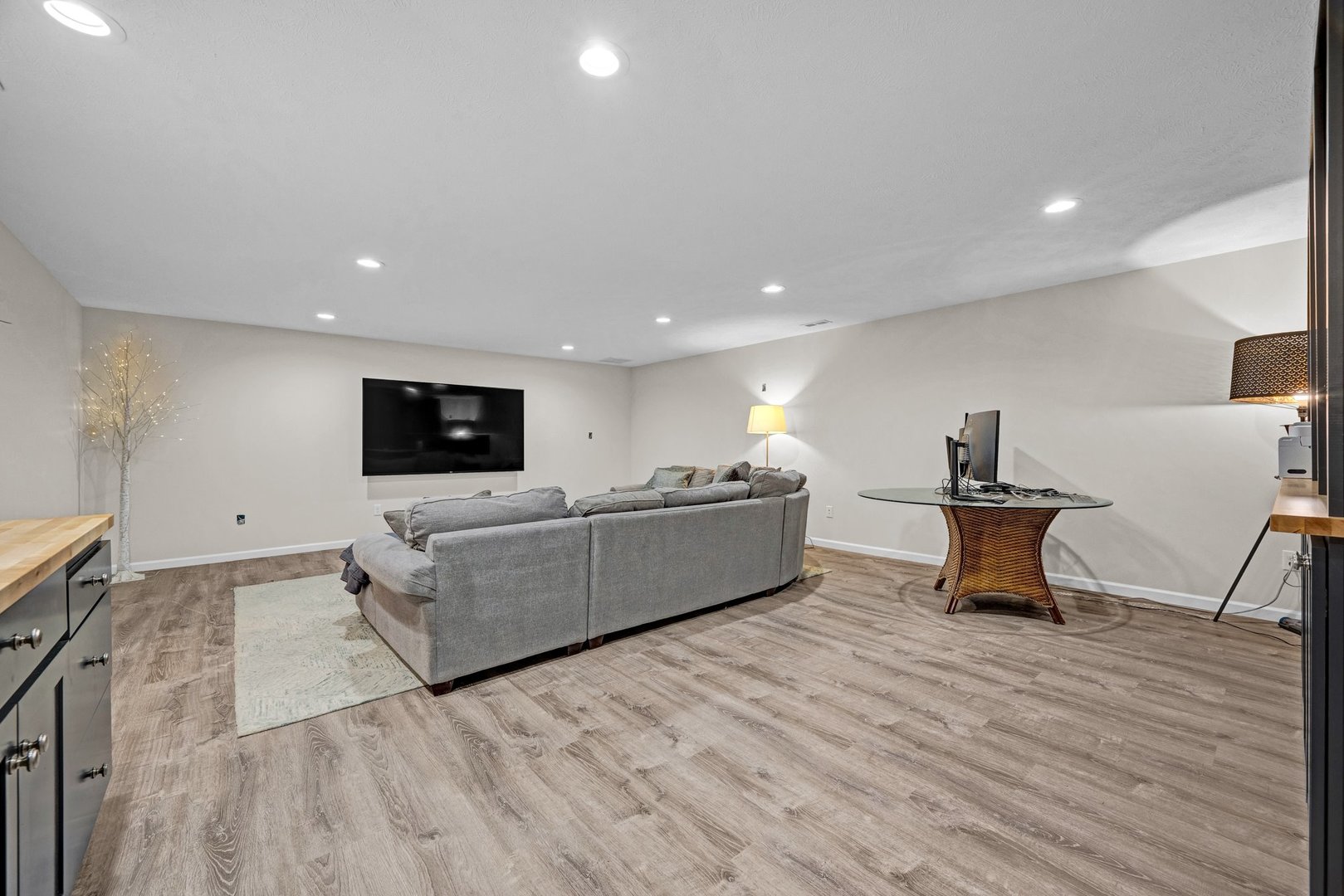 277 Cassidy Road Normal, IL 61761 - Photo 22 of 42 a living room with furniture and a flat screen tv