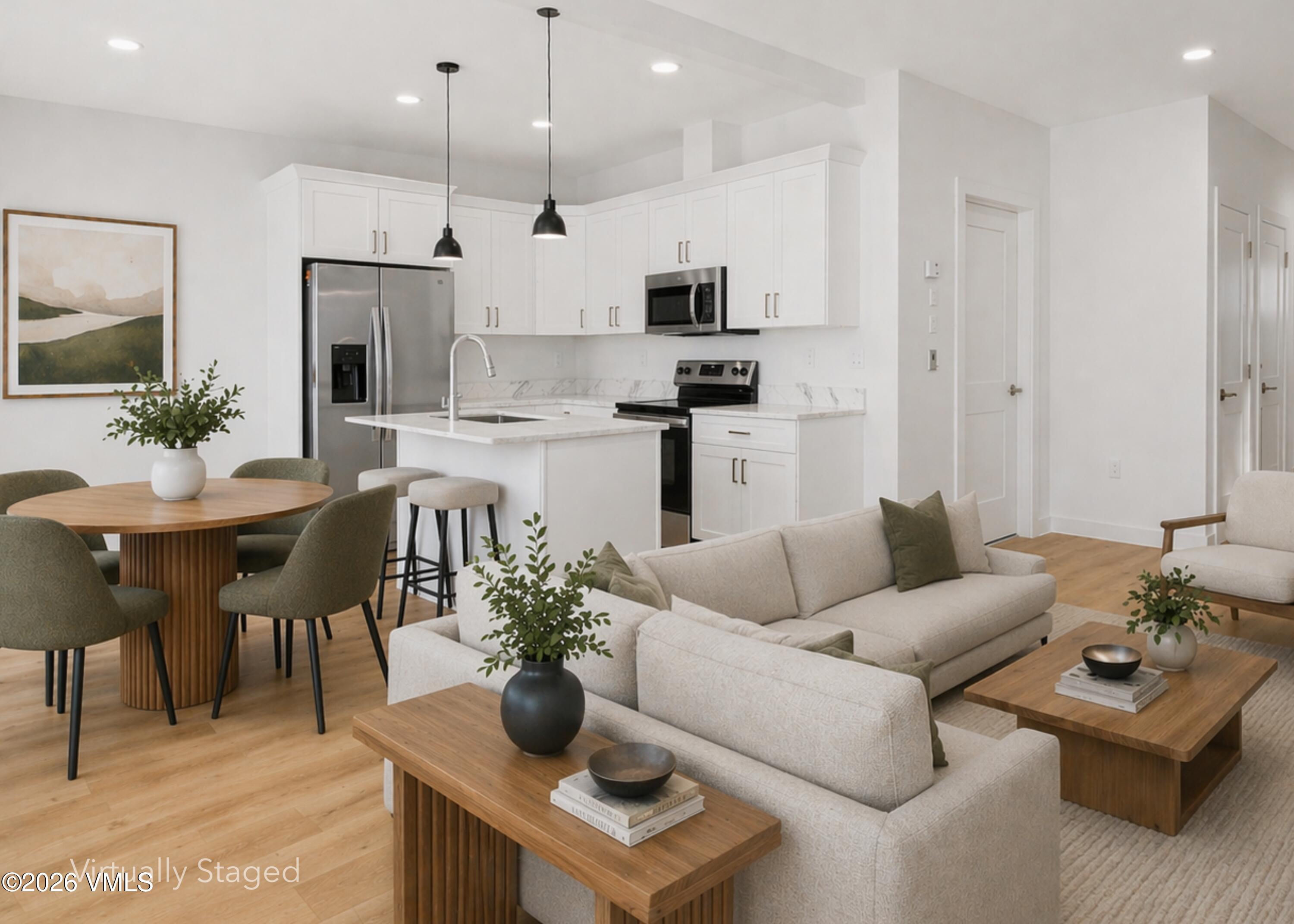 90 Comanche Way Gypsum, CO 81637 - Photo 1 of 46 a living room with furniture kitchen and a chandelier