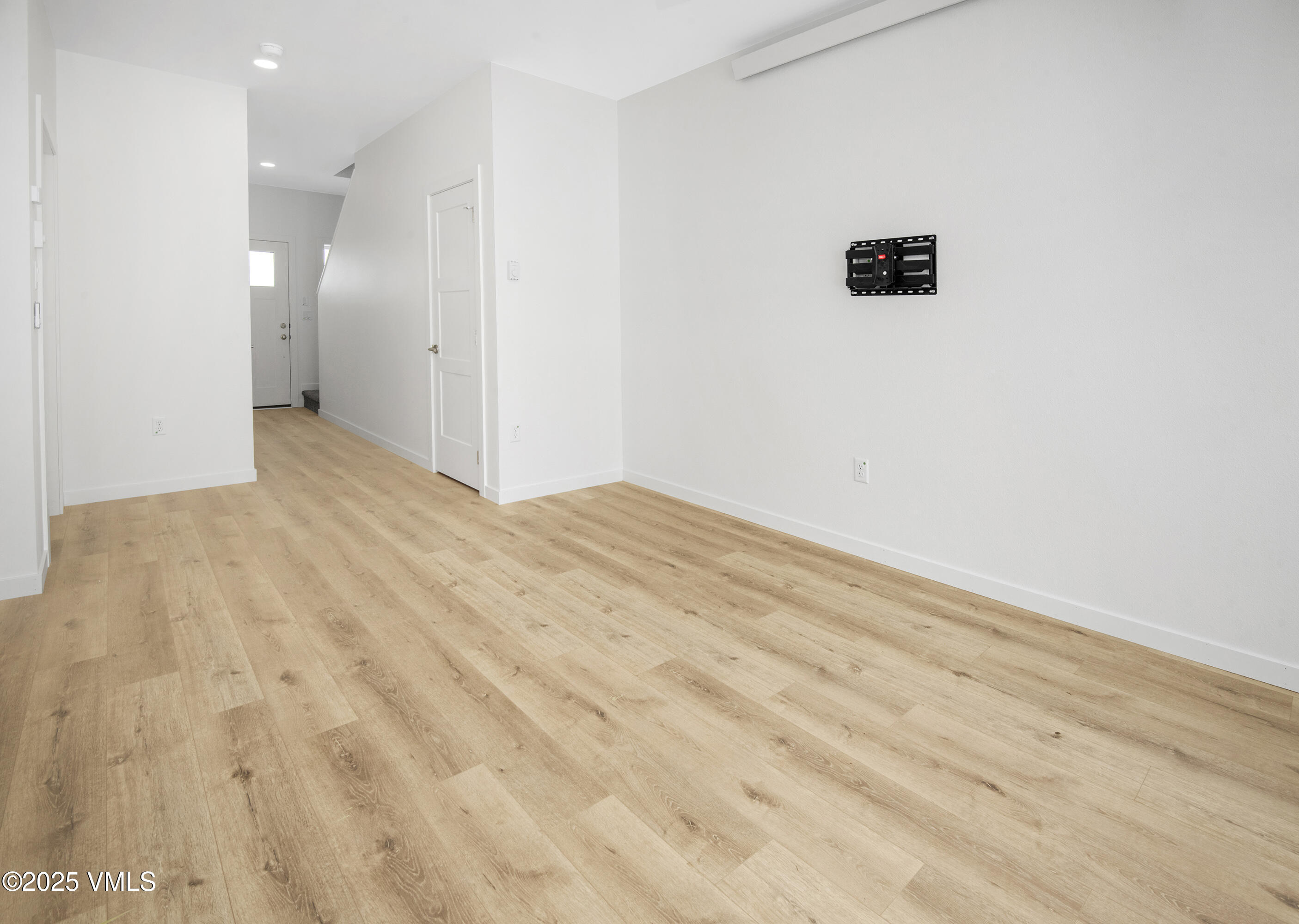 90 Comanche Way Gypsum, CO 81637 - Photo 17 of 46 a view of empty room with wooden floor