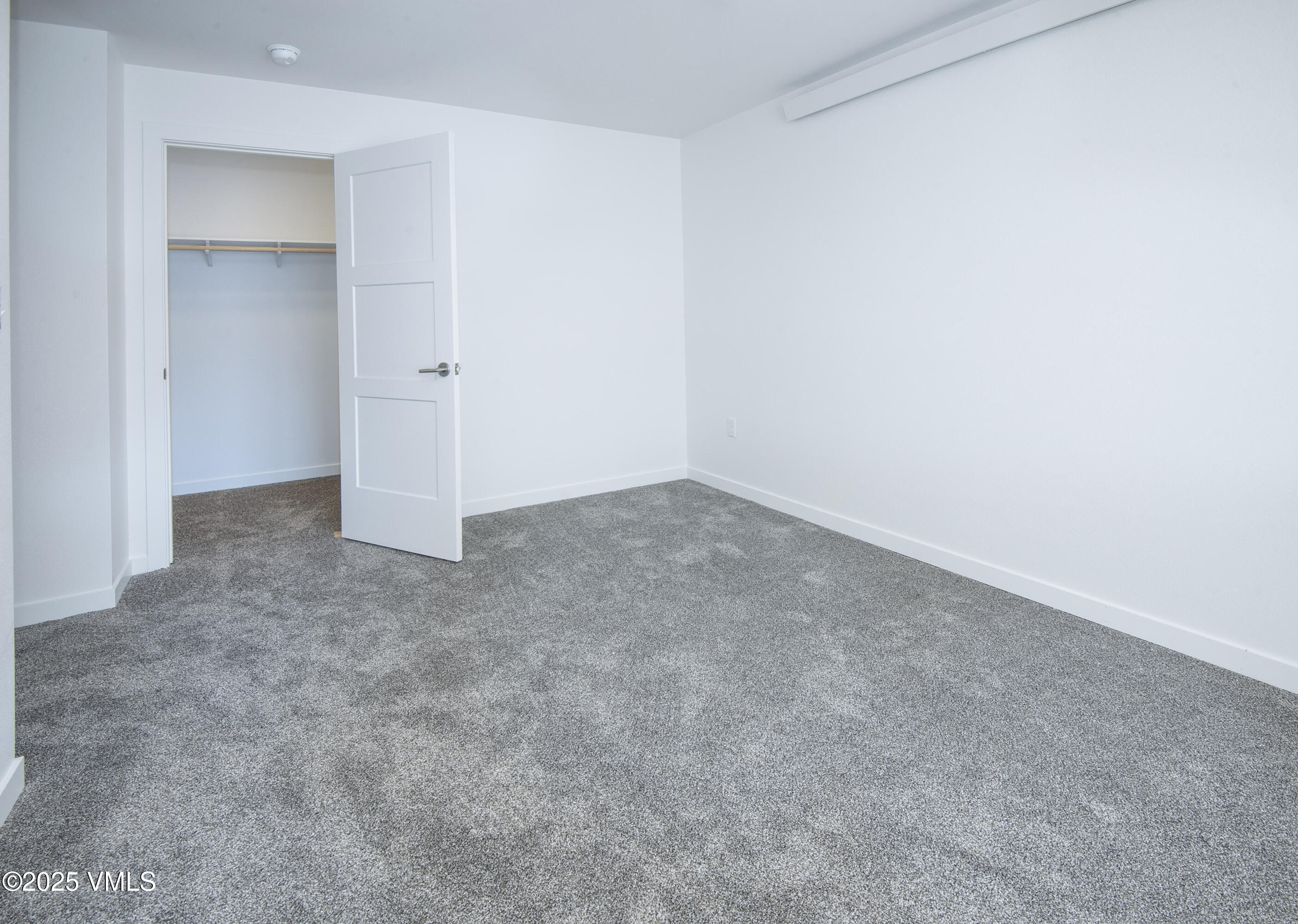 90 Comanche Way Gypsum, CO 81637 - Photo 21 of 46 an empty room with an entryway