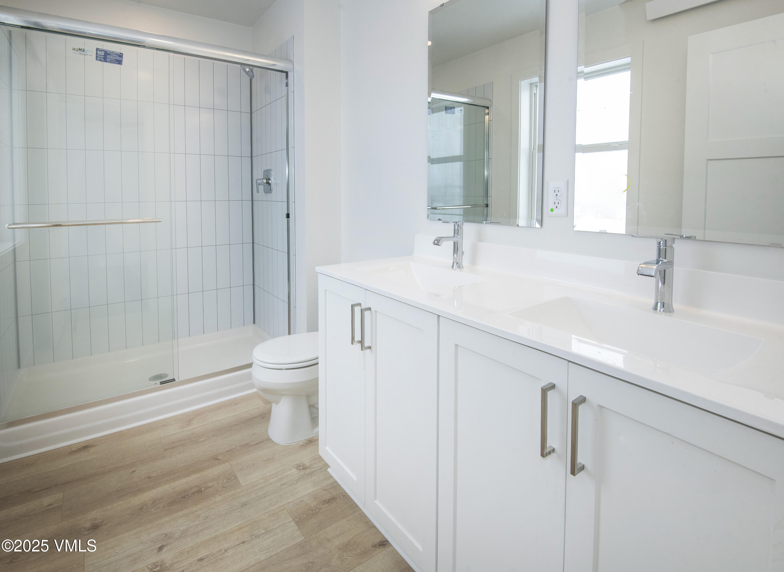 90 Comanche Way Gypsum, CO 81637 - Photo 26 of 46 a bathroom with a sink a toilet and shower