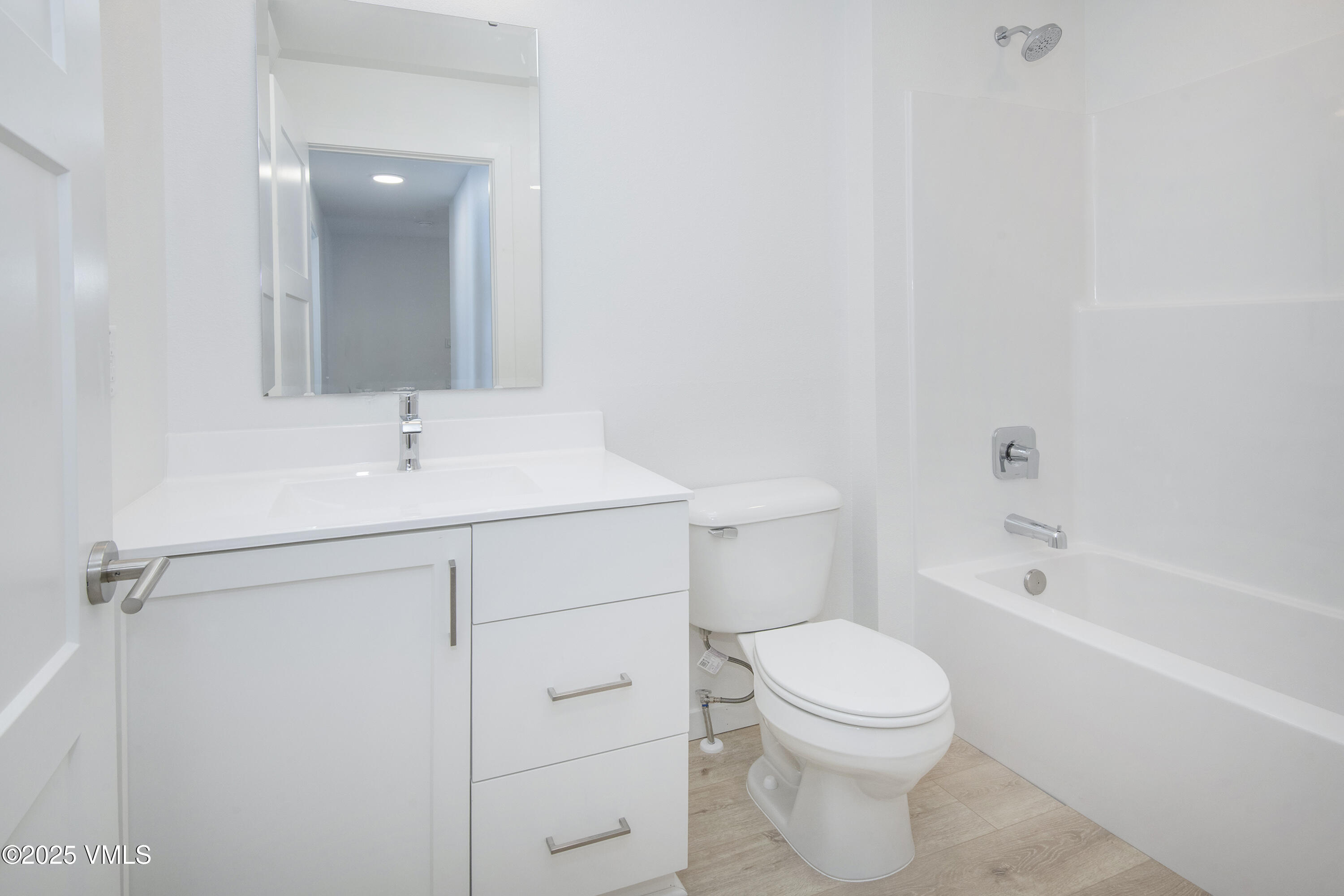 90 Comanche Way Gypsum, CO 81637 - Photo 32 of 46 a bathroom with a sink a toilet and shower