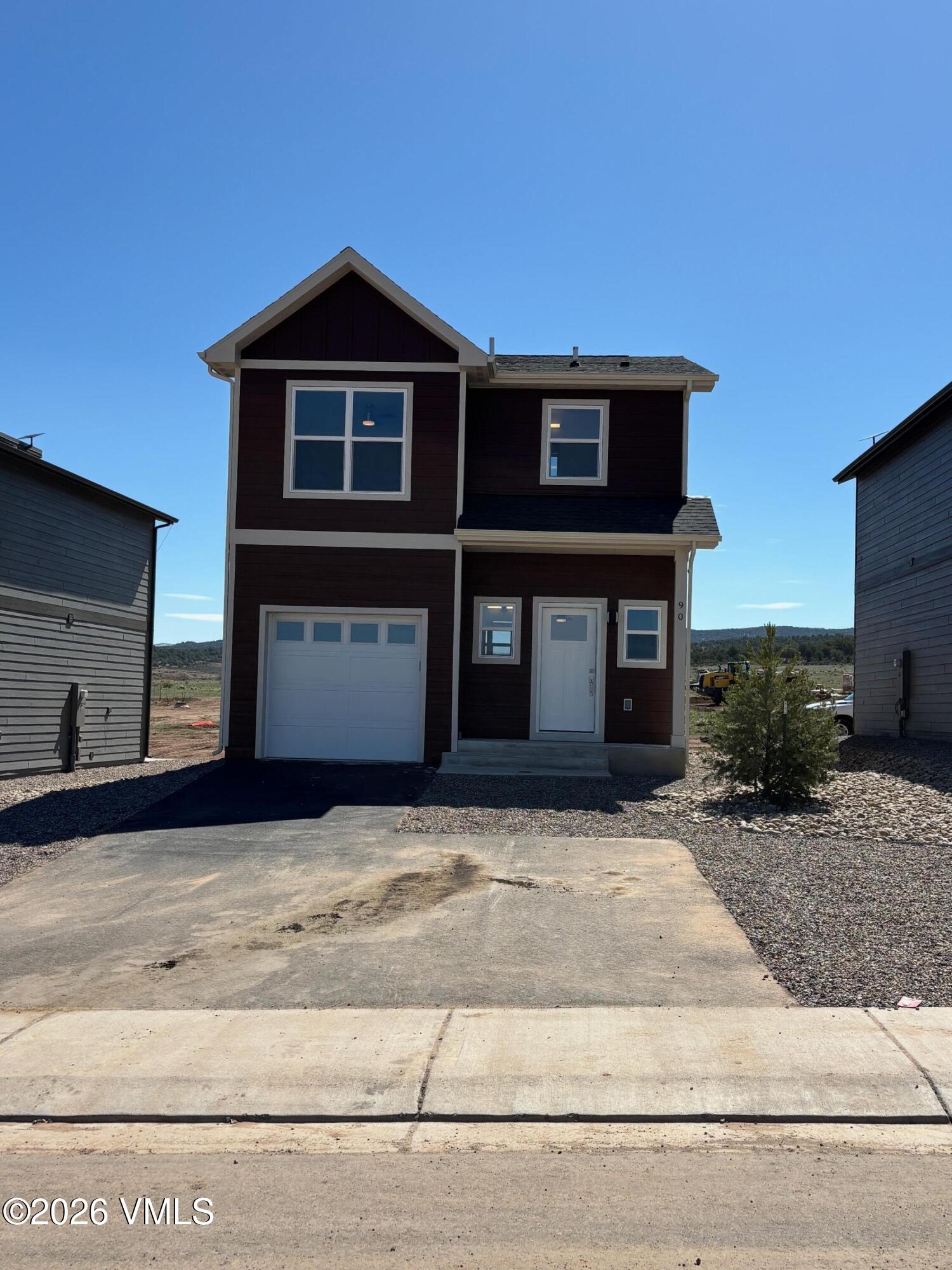 90 Comanche Way Gypsum, CO 81637 - Photo 4 of 46 a view of a house with a yard