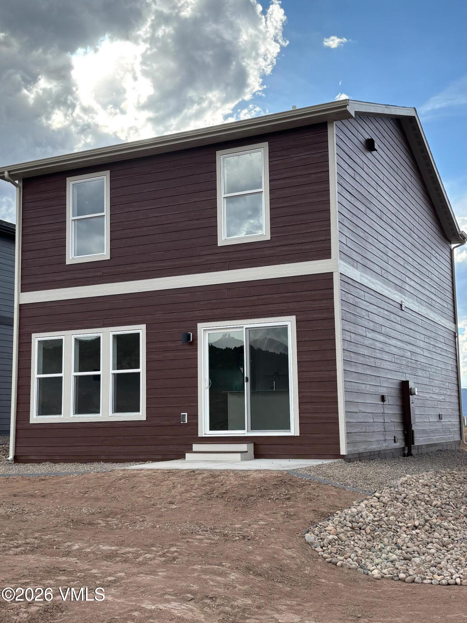 90 Comanche Way Gypsum, CO 81637 - Photo 7 of 46 a front view of a house with windows