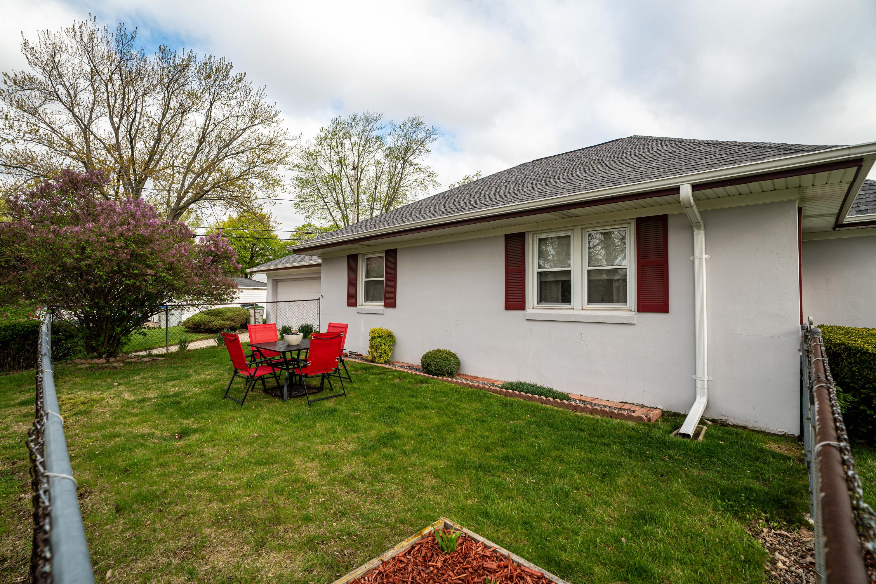 2777 South 68th Street Milwaukee, WI 53219 - Photo 14 of 16 Fenced in yard w/ lilac bush!