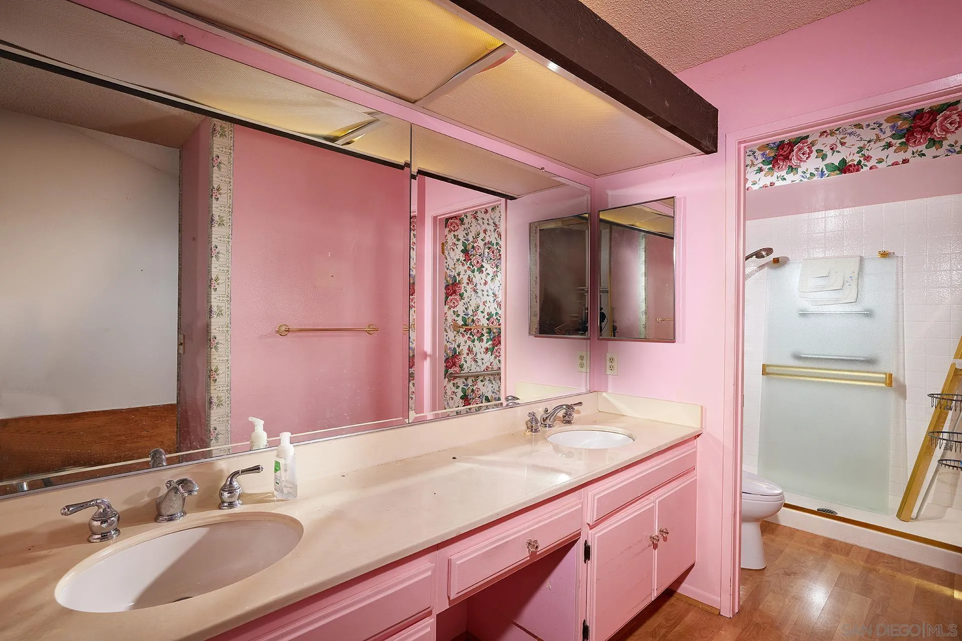 138 Townwood Way Encinitas, CA 92024 - Photo 16 of 48 a bathroom with a sink and a mirror