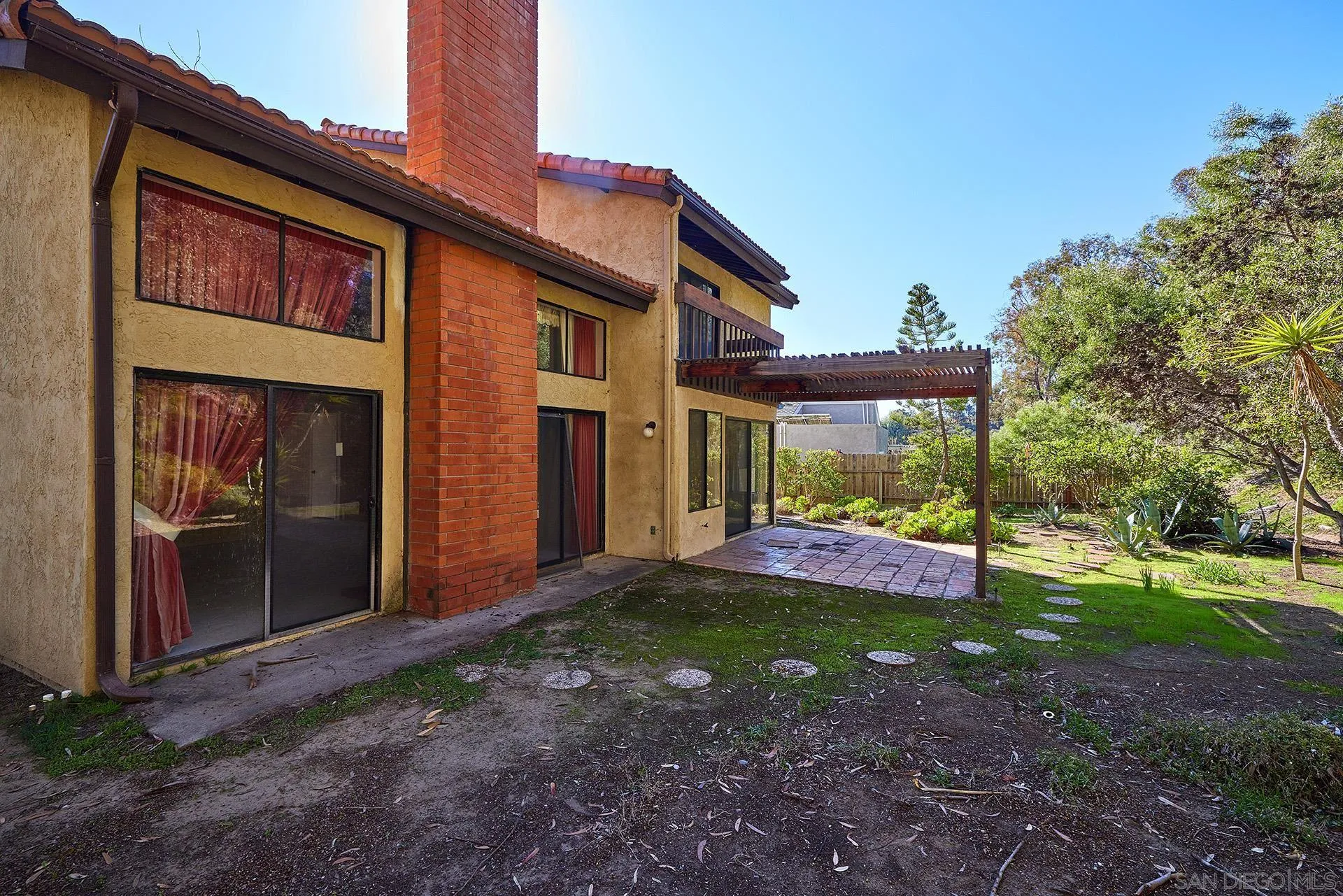 138 Townwood Way Encinitas, CA 92024 - Photo 17 of 48 a view of a house with backyard porch and sitting area