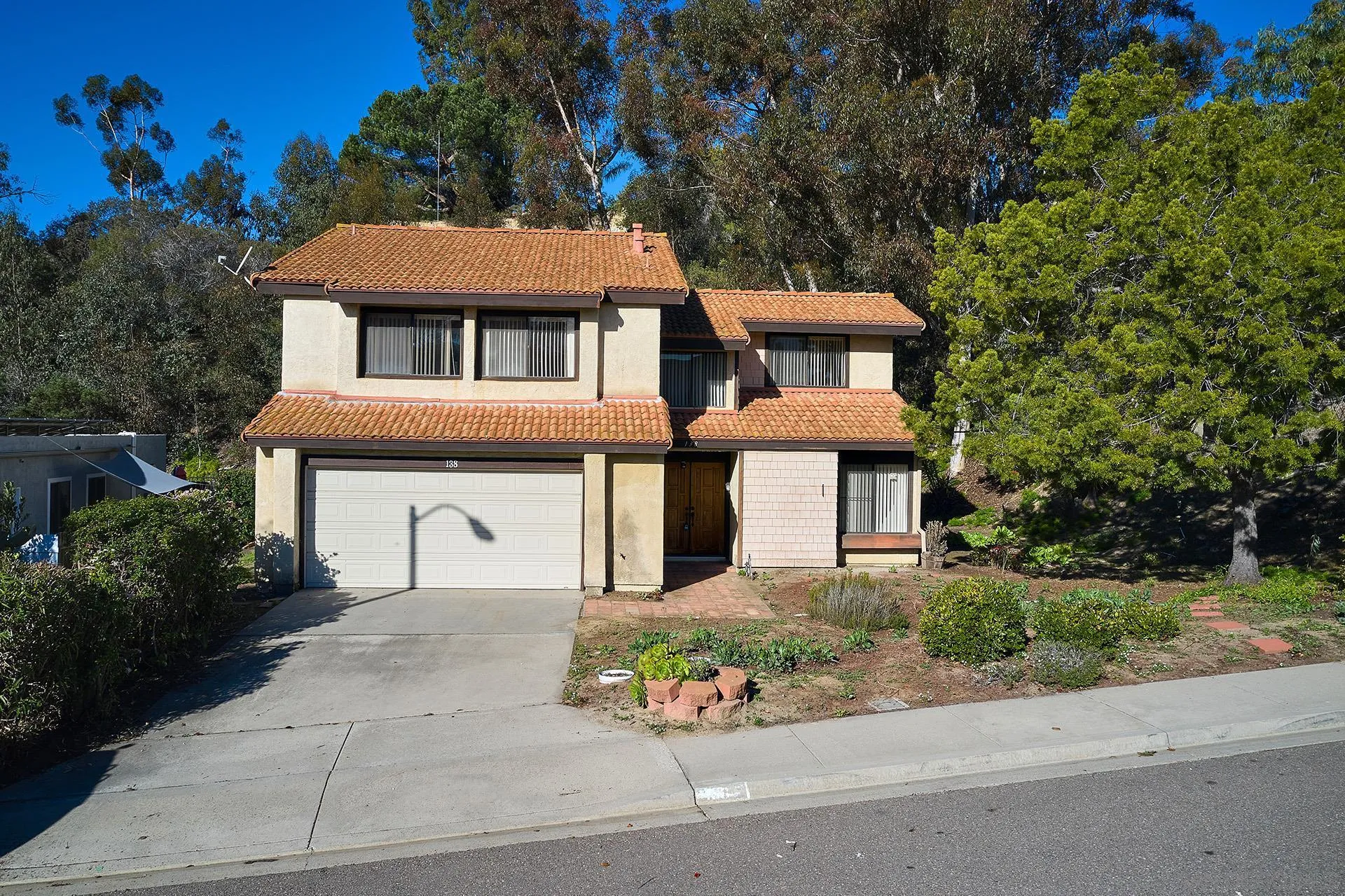 138 Townwood Way Encinitas, CA 92024 - Photo 23 of 48 front view of a house with a yard