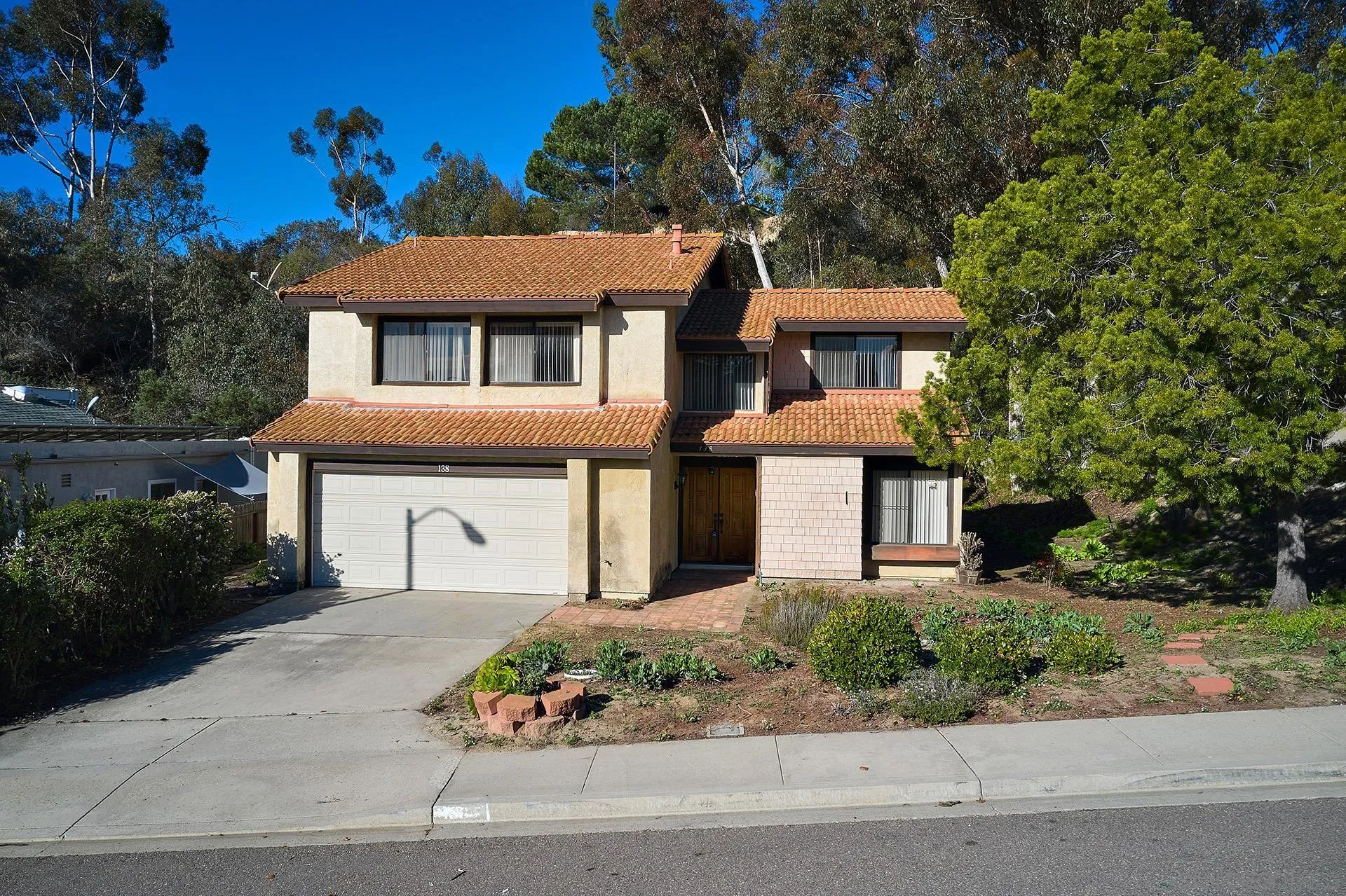 138 Townwood Way Encinitas, CA 92024 - Photo 24 of 48 front view of a house with a yard