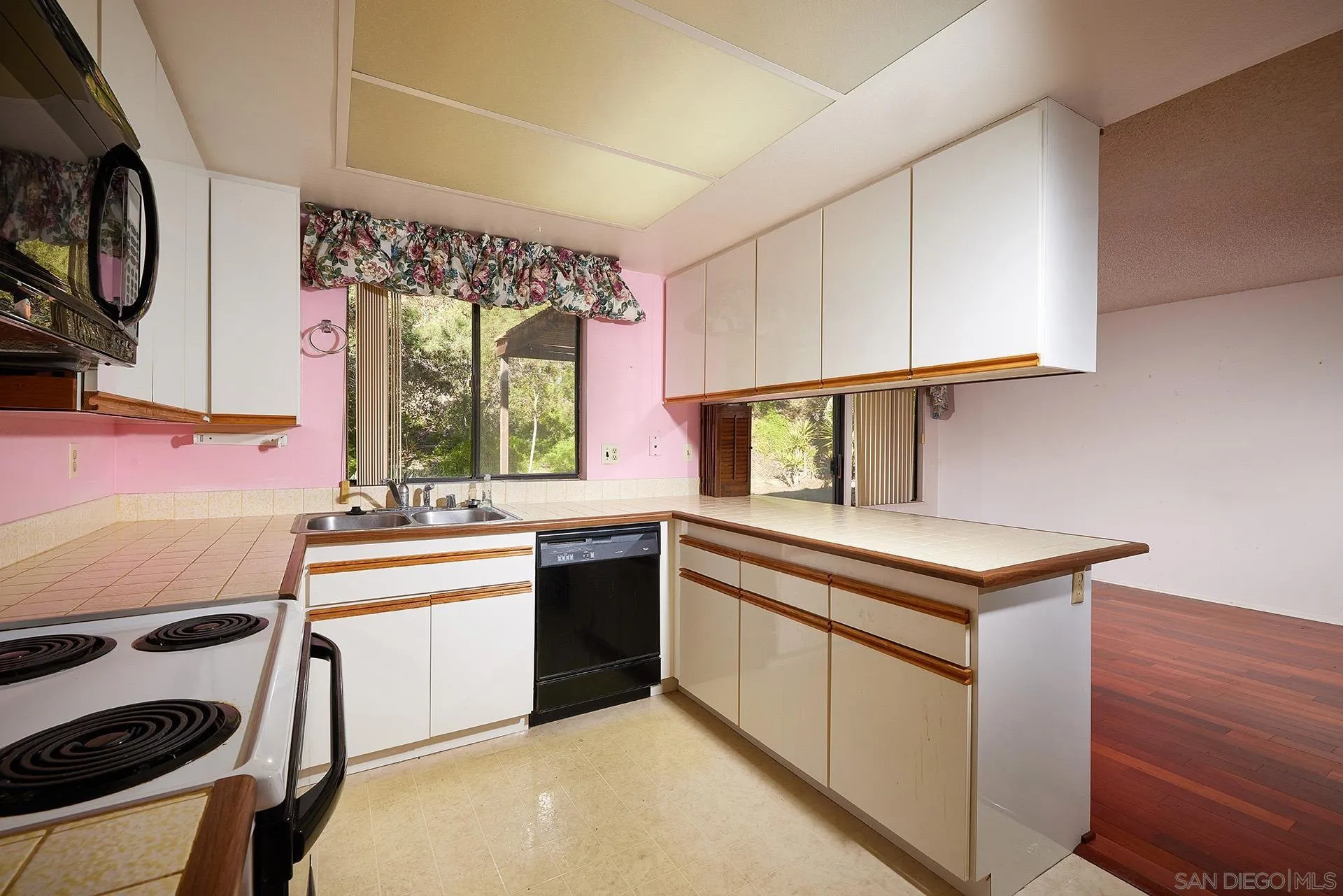 138 Townwood Way Encinitas, CA 92024 - Photo 6 of 48 a kitchen with a stove and a sink
