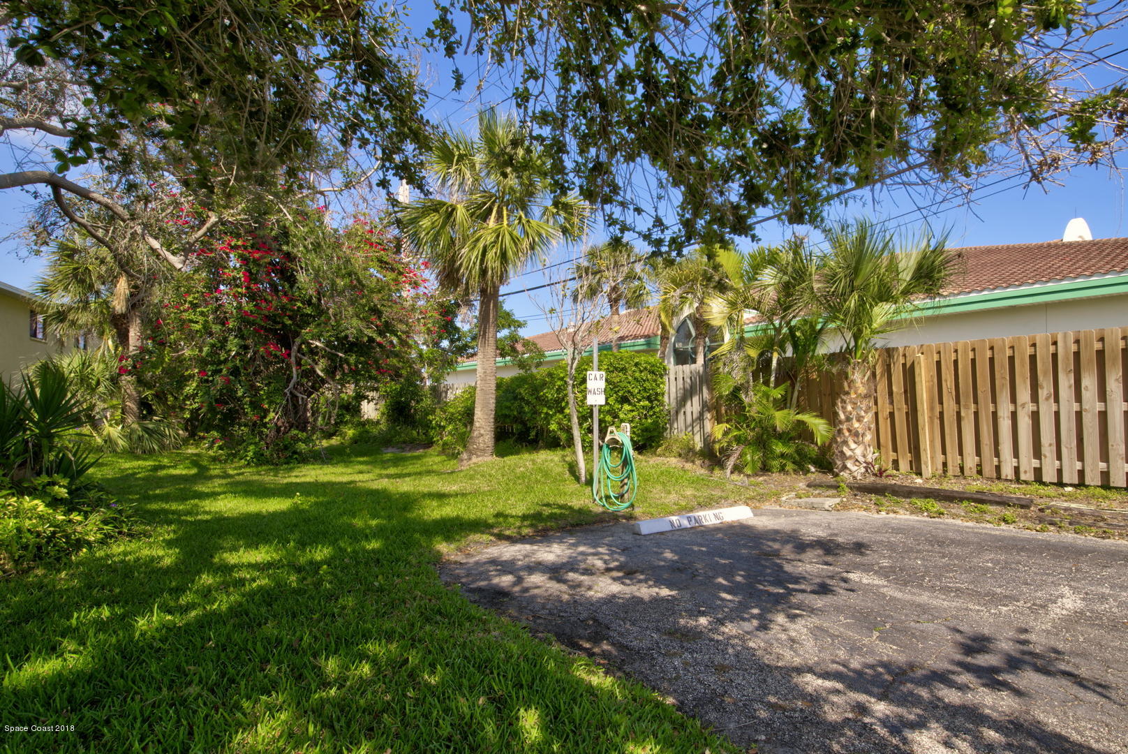 500 Catalina Road, Unit 405 Cocoa Beach, FL 32931 - Photo 22 of 22 Car Wash Area - Additional Parking